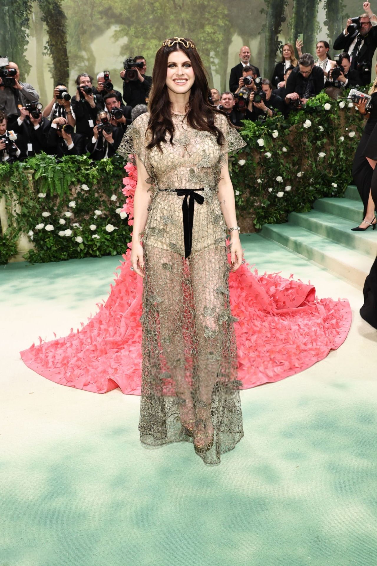 ALEXANDRA DADDARIO STUNS WITH SERPENTINE HEADPIECE AT 2024 MET GALA IN NEW YORK05